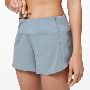 lulu chambray speed up mid-rise shorts. 4” inseam. size 8